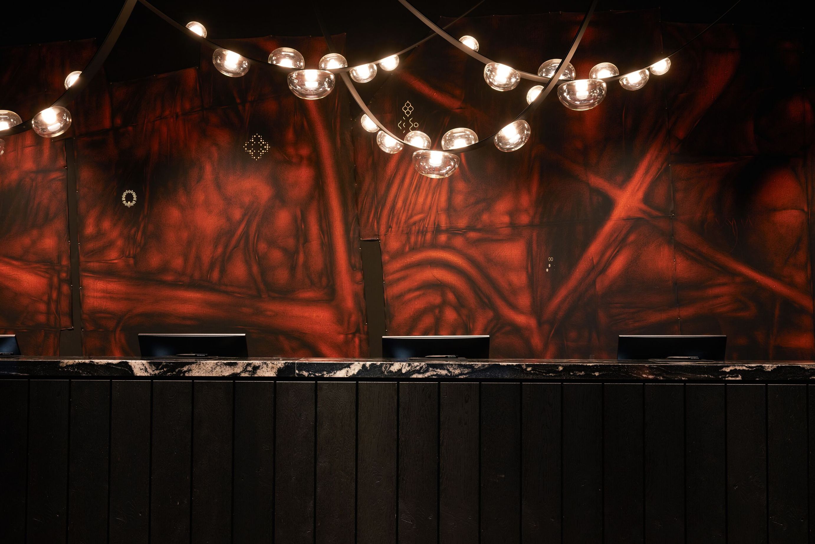 designhotel Gdansk The Cloud One reception area with artwork by Vasyl Savchenko on the wall