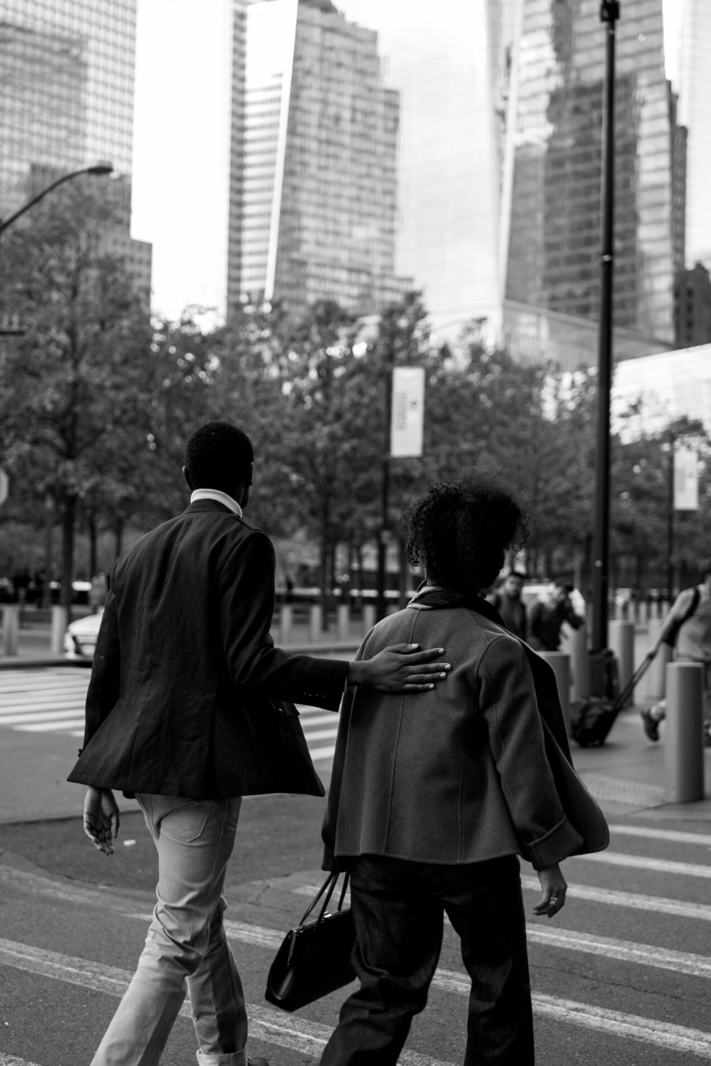 Man and woman walking the streets of NYC