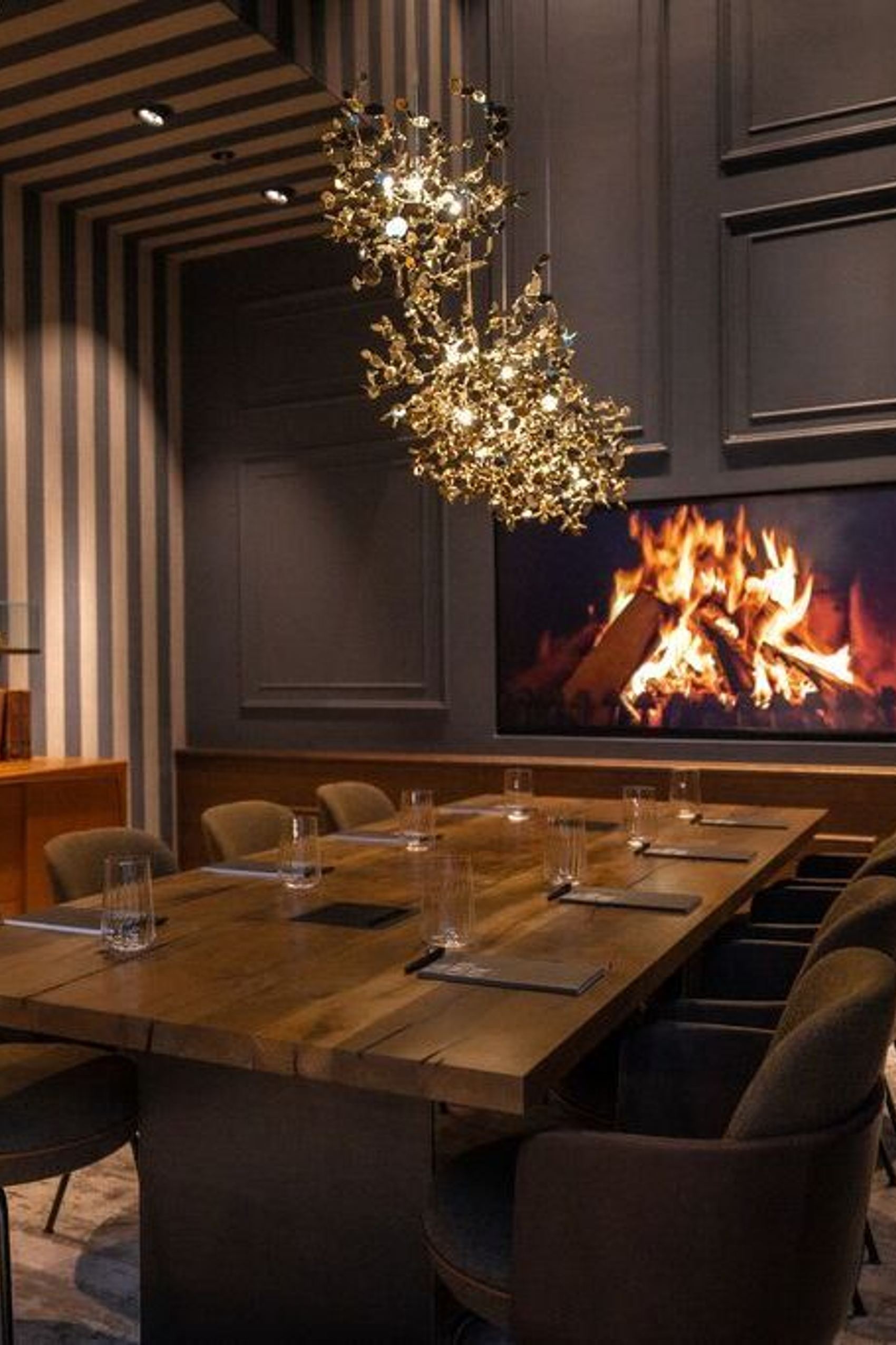 Designhotel Hamburg Kontorhaus The Cloud One Meetingraum mit großem Tisch und Fernseher